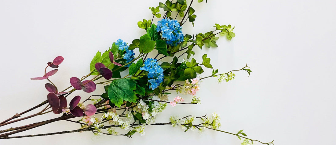 What is the difference between artificial and dried floral arrangements? - Miss One